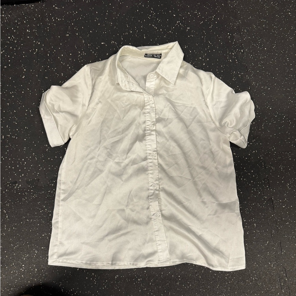 Women’s silk white blouse size small.